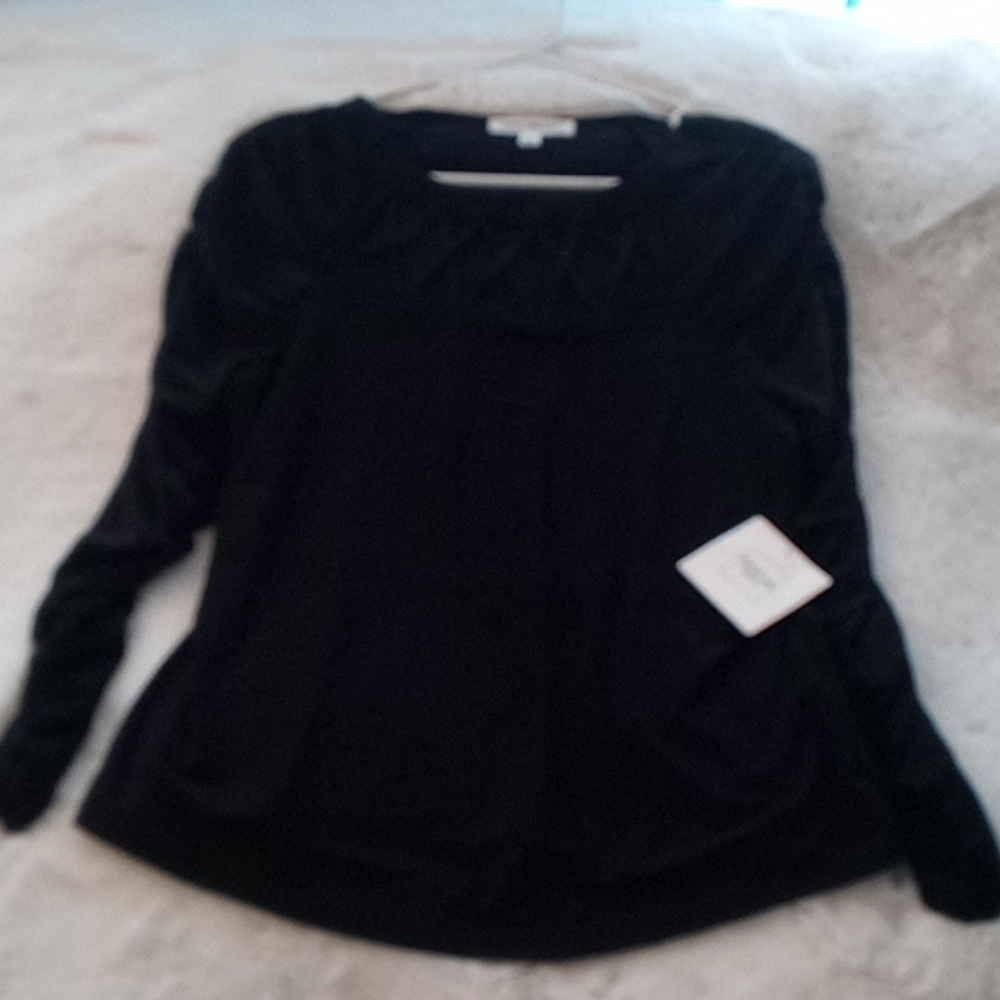 Black dressy top with cut out front.